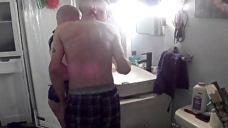 Shaving his head!