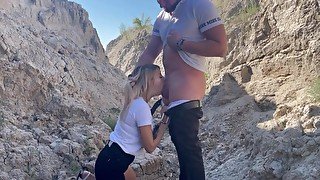 gave his cock in the mouth of a beautiful blonde outdoors in a canyon