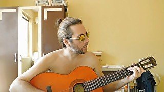 Naked Dude Plays the Guitar