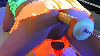 Sissy Lucy machine fucked by glowing dildo whilst locked in chastity