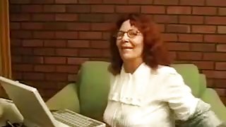 Horny old lady in glasses just loves masturbating on camera