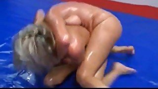 Oiled girls topless wrestling