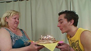 Skinny European dude is getting a blowjob from a GILF