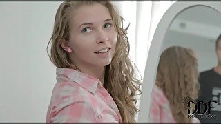 Teen beauty with curly hair blows him