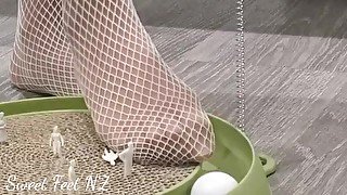 Giantess playing with Tiny People in Fishnet Stockings