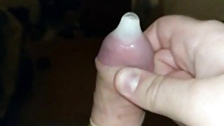 Close up slow motion condom cum