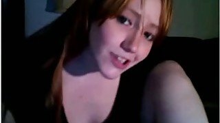 Redhead teen smashes her pussy with a dildo on webcam