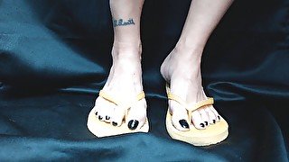 Yellow flipflops closeup shoeplay