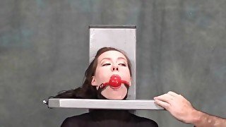 Attractive lady performing in BDSM action