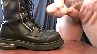 Daddy squirts cum load on his motorcycle boots