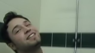 Stunning gay taking shower then giving dick superb blowjob