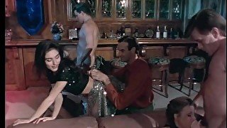 Hardcore group sex action in a bar