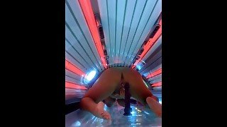 Thick milf takes her bbc dildo to the tanning salon & squirts all over the sunbed