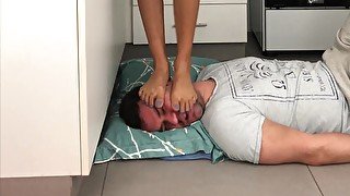 Kitchen face trampling and face busting ( facestanding, femdom)