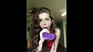 Deep throating a dildo