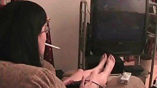 Smoking girl plays video games