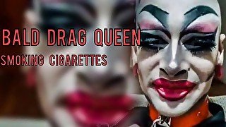 Bald Drag Queen smoking with extreme makeup