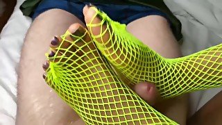 Black Girl In Fishnets Gives A White Cock A Footjob With Her Black Feet