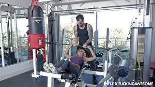 Passionate fucking on the gym floor ends with a facial for Kayla Kayden