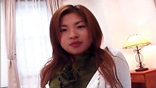 Japanese chick unbuttons cardigan in tease vid