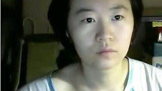 Asian serious or even dull looking webcam Asian whore exposed her tits