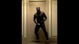 masked bicyclist jerking off in hotel hall