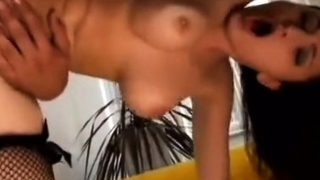 Amateur brunette in latex lingerie fucks hardcore in kitchen