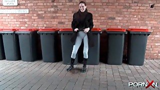 Pretty girl in leggings pisses in public