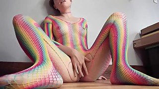 Short Haired Teen Masturbates Hard On The Floor In Her Colorful Fishnets