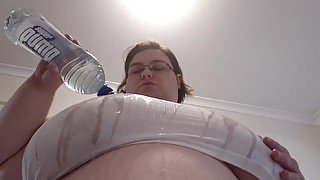 Big wet BBW titties in a tight white shirt and a bottle of water