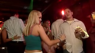 Mini-skirt clad cougar with big boobs dancing and having fun