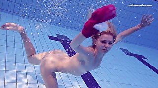 Elena Proklova shows how sexy can one be alone in the pool