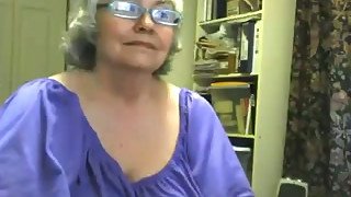 Lewd chubby granny shows her meaty shaved crotch for the cam