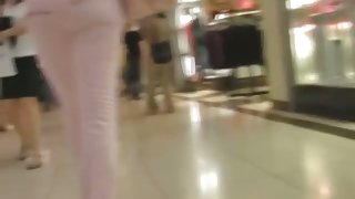 Candid public clip of a hot girls jean ass walking