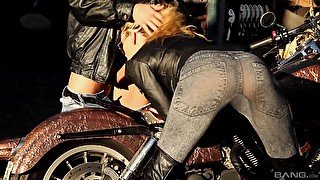 Trendy biker babe Jazy Berlin bent over a motorcycle and pounded hard