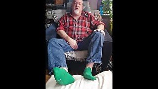 Bear jerks off in green socks