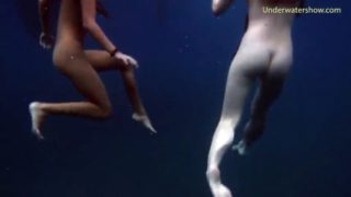 Submerged hot babes underwater