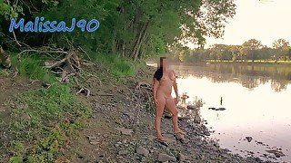 Posing nude by the river