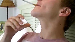 Kinky Noah Brooks fingers himself while smoking and wanks