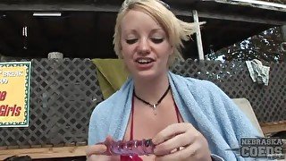 Sweet smiling blonde amateur toys pussy outdoors