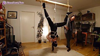 Shibari play session with suspension in butterfly harness and spanking