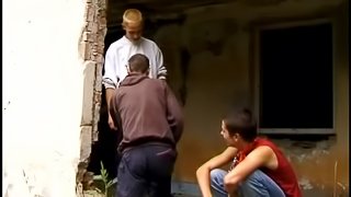 Three guys have a rough threesome in an abandoned building