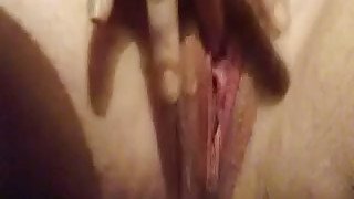 BBW hoe inserts four fingers in her fatty pussy in closeup masturbation video