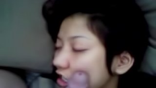 Lovely Asian chick expecting cum on her sweet face