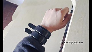 MY BONDAGE PET in a Black Leather Cuff Bracelet