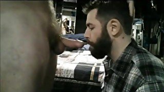 Bearded guy gets facefucked by big curved cock and swallows all the cum.