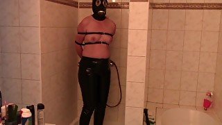 Tied and desperate in PVC trousers