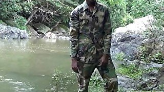 Cock-strong twink soldier by the river