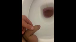 Sexy guy pissing