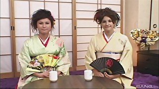 Cute brunette wears her sexy kimono to seduce and please her lover